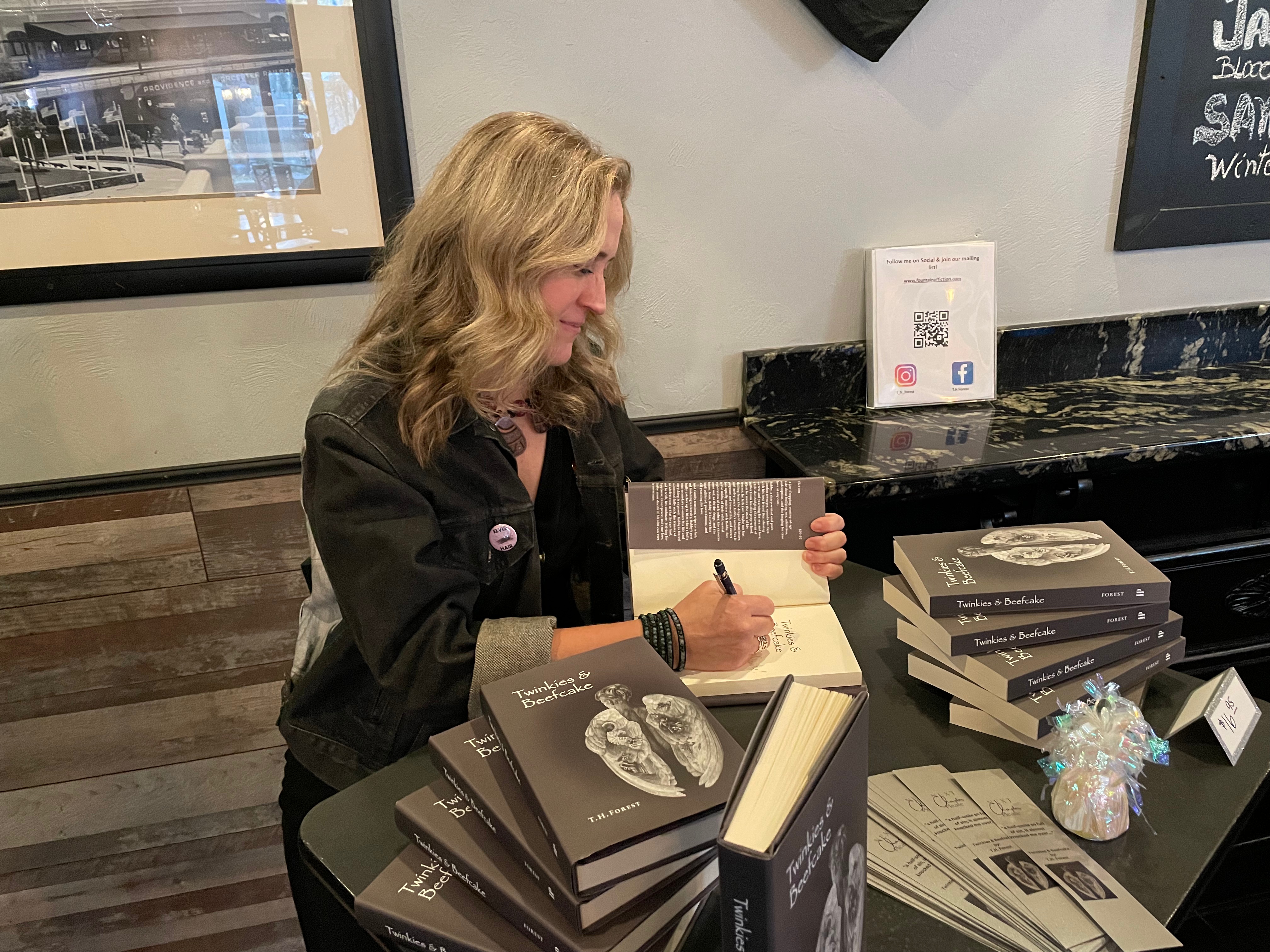 Author signing book